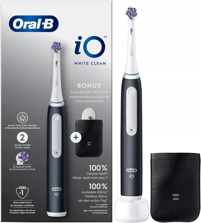 Oral-B toothbrush, white and black + cover